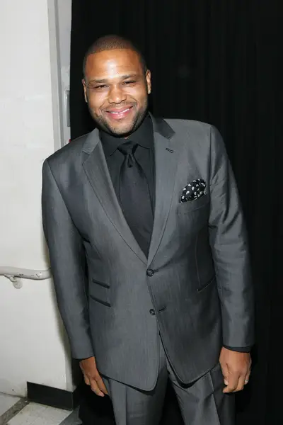 From the Soul Train to the Honors - Funnyman Anthony Anderson is all smiles before he takes the stage to present the Visual Arts Award to Carrie Mae Weems.&nbsp;(Photo: Bennett Raglin/BET/Getty Images for BET)