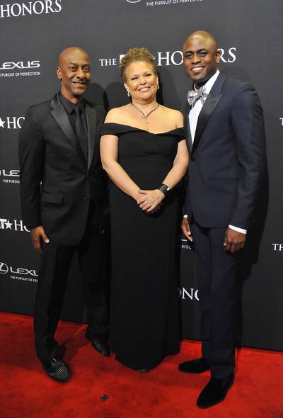 Black Excellence - President of Music, Programming, and Specials of BET Networks Stephen G. Hill, Chariman, Chief Executive Officer of BET Networks Debra L. Lee, and BET Honors host Wayne Brady pose like a big happy family before the evening begins.  (Photo: Larry French/BET/Getty Images for BET)
