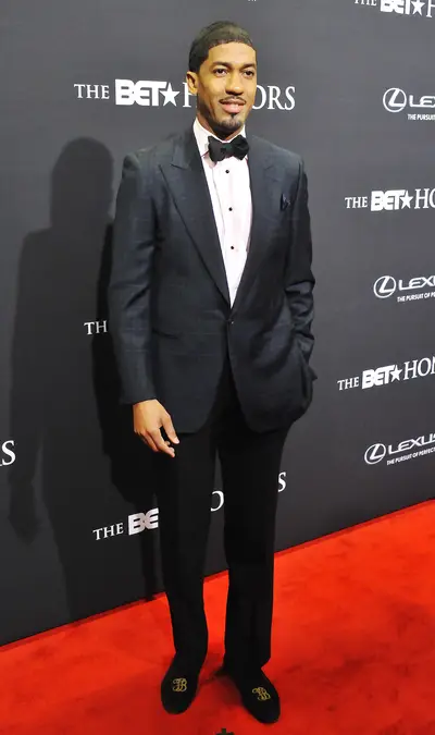 Elevated - BET.com's red carpet host Fonzworth Bentley has always been known for his style and tonight was no different as he took to the red carpet in his plaid blazer coupled with his custom monogram shoes.  (Photo: Larry French/BET/Getty Images for BET)