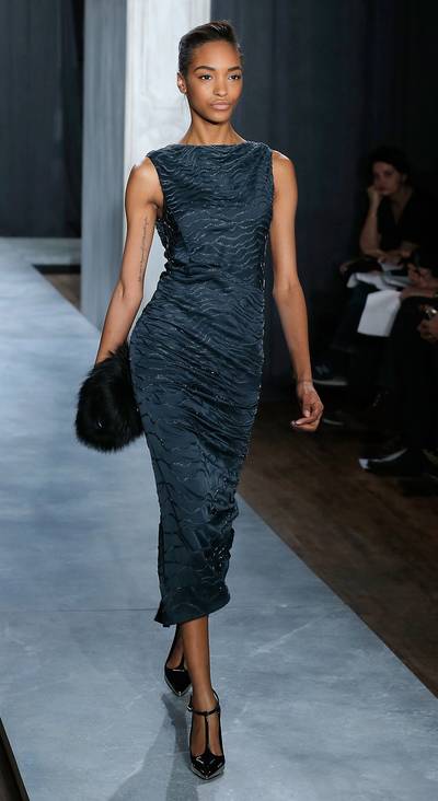 Jason Wu - Catwalk queen Jourdan Dunn is giving us lots of Old Hollywood glamour in this midnight blue cocktail gown teamed with a feathered clutch and patent T-strap pumps. Excuse us while we swoon.(Photo:Jemal Countess/Getty Images)