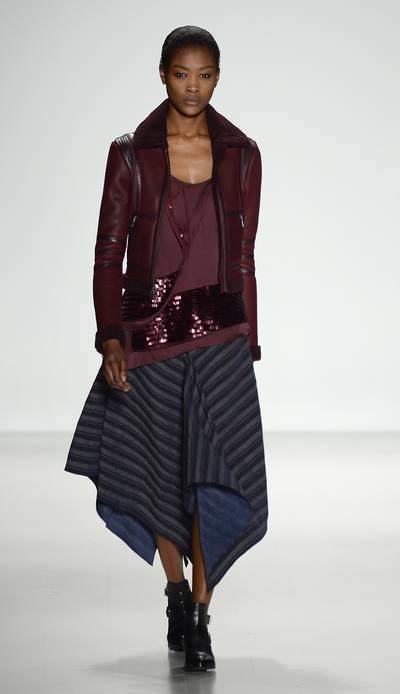 Richard Chai - Garnet and gray is a go-to combination for fall, a great twist on the gray and navy tones of the past. We’ll be scooping up a pair of Chai's buckled ankle booties, too.  (Photo: Frazer Harrison/Getty Images For Mercedes-Benz Fashion Week)