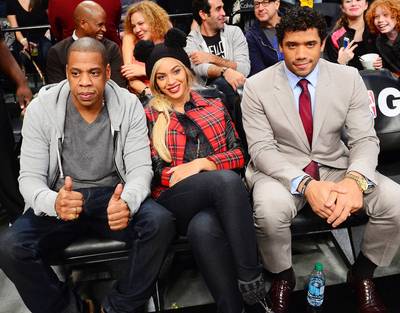 Russell Wilson Spotted Courtside With the Carters - OK, so you won the Super Bowl, but you really know you’ve made it when you are spotted courtside with Jay Z and Beyoncé Carter. Seattle Seahawks QB Russell Wilson was spotted taking in a Brooklyn Nets game with the Carters Monday night, igniting rumors that Jay Z was courting Wilson as a client to join his Roc Nation Sports roster.(Photo: EMMANUEL DUNAND/AFP/Getty Images)