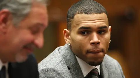 Chris Brown - If you don't know about this one, you must be new to BET. Chris Brown was sentenced with five years probation and community service in 2009 after his infamous assault of his then girlfriend, pop superstar Rihanna. &nbsp;&nbsp;(Photo: David McNew/Getty Images)
