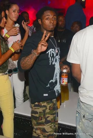 The After- Party - Lil Wayne is seen with his co-headliner T.I. and the rest of YMCMB celebrating their &quot;Americas Most Wanted&quot; tour with Hennessy V.S and Belvedere at Prive Lounge in Atlanta. (Photo: Prince Williams / ATL Pics.com)