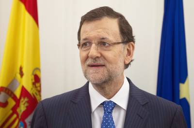 Spain's Prime Minister Under Pressure to Resign - Outraged Spaniards have called for the resignation of Prime Minister Mariano Rajoy after text messages reportedly connecting him to a secret funds scandal were published. Denying any wrongdoing, the 58-year-old leader has refused to comment.  (Photo: AP Photo/Paul White