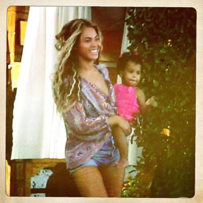 Beyoncé - Bey chilled out with her baby girl during a recent family vacation in Florida. The singer posted pics of herself and Blue Ivy walking along the beach rocking fly summer 'fits.  (Photo: iam.beyonce via Tumblr)