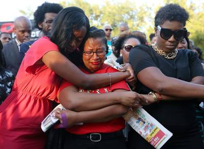 Vigil Remembering Sandra Bland - Lanitra Dean and Carlesha Harrison, two of Bland's friends, mourned together during a vigil held at Prairie View A&amp;M University, Sunday, July 19, 2015.(Photo: Jon Shapley/Houston Chronicle via AP)