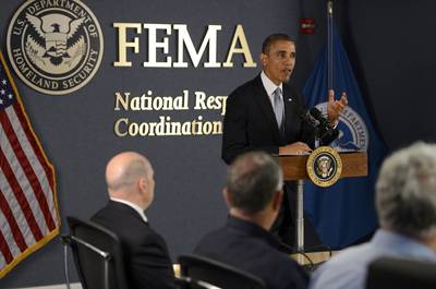 Day 7 - During a visit to FEMA, Obama called on Boehner to prove his claims that a &quot;clean&quot; short-term funding bill can't be passed in the House. &quot;My very strong suspicion is there are enough votes there,&quot; he said. &quot;Hold a vote. Call a vote right now. Let's see what happens.''  (Photo: Shawn Thew/Getty Images)