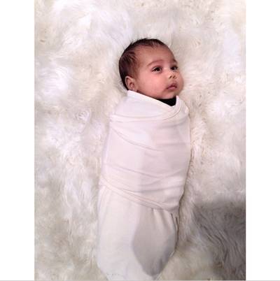 Kim Kardashian @kimkardashain - &quot;I missed waking up with my little [angel emoji]&quot; Kim Kardashian returned home from Fashion Week in Paris to a burrito-wrapped Baby North. The fashionista mom also posted pics of the many designer duds she recieved for North West from top labels while overseas. This baby is going to have some serious style!(Photo: Instagram/KimKardashian)