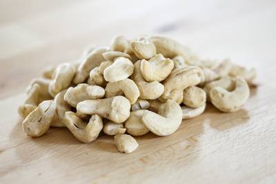 Cashews - Studies show “nutty” diets help reduce weight gain and heart disease.  These oblong treats are rich in iron, phosphorus, selenium, magnesium and zinc. They’re also a good source of phytochemicals, antioxidants and protein.   (Photo: Jon Boyes/Getty Images)