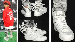 Detroit Che - The Hot 16 winner made sure to rep for her hometown by wearing a Detroit Redwings hockey jersey with a pair of Adidas Jeremy Scotts Wings with clear plastic paneling. Observers should take note that her sneakers had the distinct wings on them that served as the perfect complement to the wings on her jersey. According to her she "went through four pairs" before settling on a size 6.&nbsp;If you like these, check out similar styles at&nbsp;JimmyJazz.com/BET.&nbsp;Get 10% off &amp; free shipping through Nov.15th. Use promo code BET1. Some exclusions apply.  (Photos: Getty Images for BET)