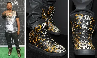 Loaded Lux - Loaded Lux was looking sharp on the carpet, rocking a pair of Adidas ObyO x Jeremy Scott Instinct Hi with leopard-print pattern. As he put it, it's the "fastest way to Harlem."&nbsp;If you like these, check out similar styles at&nbsp;JimmyJazz.com/BET.&nbsp;Get 10% off &amp; free shipping through Nov.15th. Use promo code BET1. Some exclusions apply.(Photos: Getty Images for BET)