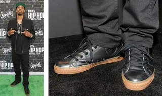 Chevy Woods - Chevy Woods stepped foot onto the carpet repping Taylor Gang, wearing a pair of the Wiz Khalifa Converse Chuck Taylors. This particular pair was decked out in black leather with a gum sole.&nbsp;If you like these, check out similar styles at&nbsp;JimmyJazz.com/BET.&nbsp;Get 10% off &amp; free shipping through Nov.15th. Use promo code BET1. Some exclusions apply.(Photos: Getty Images for BET)