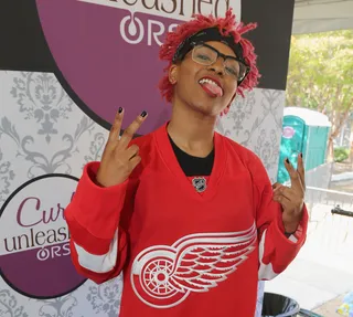 Detroit Che - The multi-talented artist from Motor City represents her hometown in a Red Wings jersey and matching Kool-Aid colored hair. (Photo: Johnny Nunez/BET/Getty Images for BET)