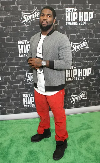 Tsu Surf Adds Some Color&nbsp; - Tsu Surf's red pants add a nice pop of color to his look.   (Photo: Bennett Raglin/BET/Getty Images for BET)&nbsp;