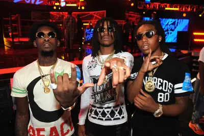 Migos - Word is the Migos&nbsp;have been feeling the fan pressure lately.&nbsp;OffSet&nbsp;reportedly tore the club up in Springfield, Mass., jumping off stage and landing a punch on a concertgoer. His crew followed behind him as a melee ensued. Prior to that, the group also [allegedly] beat down a would-be chain snatcher in Nashville, Tenn.(Photo: Brad Barket/BET/Getty Images)