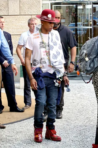 P in Prague - Pharrell Williams shows off his eclectic style while leaving the Four Seasons Hotel after performing the night before in Prague.(Photo: © PacificCoastNews)