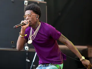 2014 Lollapalooza Festival – Chicago - Rich Homie Quan&nbsp;called it perfectly on his Instagram.&nbsp;His raucous performance at the 2014 Lollapalooza festival at Grant Park in Chicago last month was a straight &quot;movie.&quot; After his DJ got the crazed crowd hyped, RHQ came through and handled the rest, rattling through his growing collection of records, including &quot;Get TF Out My Face.&quot;(Photo: Josh Brasted/FilmMagic)