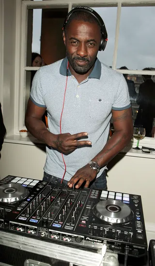 Big Driis - The very handsome British actor Idris Elba mans the one's and two's at the Esquire Summer Party in association with Stella Artois at Somerset House in London. (Photo: Dave M. Benett/Getty Images)