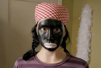 Sarah Silverman on The Sarah Silverman Program - The Holocaust, ex-boyfriends and a variety of topics have all been targets of this brunette comedienne, but Silverman didn't win herself many fans in the Black community when she decided to call out racism by donning blackface for a skit. Prompted by a Black waiter who encourages her to &quot;walk a mile in my shoes&quot; after he overhears her moaning about getting dismissed at a white country club for being Jewish, Silverman covers her face in charcoal and calls herself Queen Latifah.&nbsp;  (Photo: The Sarah Silverman Show via Comedy Central)