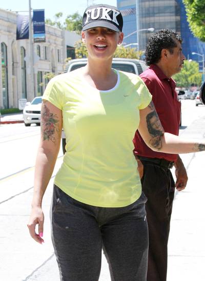 Amber Rose   - Before giving birth to son Sebastian in February, the model eased pregnancy pains with gentle stretching, joking on Twitter, “Prenatal yoga—one of the positions that got me here in the first place!”  (Photo: Splash News)