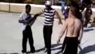 An Altercation Captured? - A photo from Trayvon's cellphone shows a group of teenagers in an apparent altercation. (Photo: Sanford District Court)