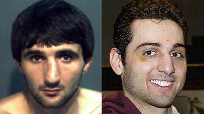 Tamerlan Is Buried - Tamerlan Tsarnaev is secretly buried in Virginia on May 9, 2013, after a weeklong search for a cemetery willing to take the body, according to AP.&nbsp;(Photos from left: Orange County Sheriff's Office via Getty Images, AP Photo/The Lowell Sun &amp; Robin Young, File)
