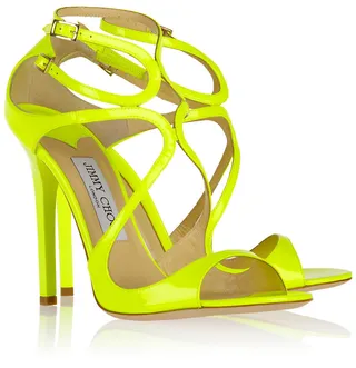 Jimmy Choo Lance Neon Patent Leather Sandal - Schedule those bi-weekly pedicures and let your pretty toes shine in this summer’s hottest heels.  Ultra feminine and incredibly fly… Stop traffic all season long in these strappy yellow stilettos by Jimmy Choo.By: Metanoya Z. Webb  (Photo: Jimmy Choo)