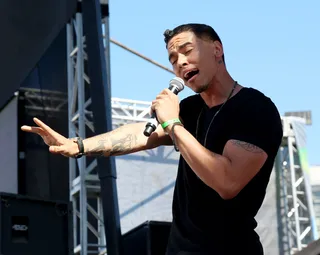 Wait A Minute! - The concert was already in full swing when soul newcomer Adrian Marcel made a surprise appearance. The Raphael Saadiq protege is certainly carving out a nice spot for himself in the R&amp;B/soul landscape.  (Photo: Imeh Akpanudosen/Getty Images for BET)