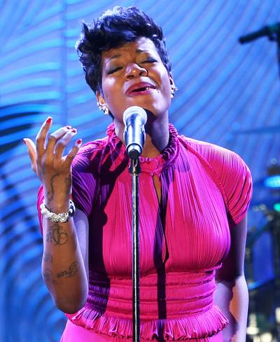 Fantasia - Although she was invited as a guest of The&nbsp;Real Housewives of Atlanta stars Greg and NeNe Leakes'wedding in 2013, American Idol winner Fantasia couldn't help getting on the mic and belting out &quot;When I Fall in Love.&quot;(Photo: Frederick M. Brown/Getty Images)