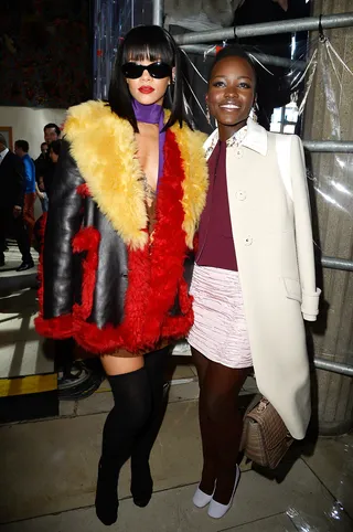 It Girls - Rihanna and&nbsp;Lupita Nyong'o&nbsp;turn heads as the gorgeous pair pose for pics at the Miu Miu runway show at Paris Fashion Week.  (Photo: Pascal Le Segretain/Getty Images)