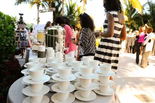 Pick-Me-Up - Guests refuel with coffee and healthy snacks before heading to their next session.   (Photo: Sergi Alexander/Getty Images)