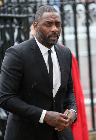 Paying Respect - Idris Elba, who stars as Nelson Mandela in the acclaimed film&nbsp;Mandela: Long Walk to Freedom, heads into a National Service of Thanksgiving to celebrate the life of the South African civil rights leader at Westminster Abbey in London.&nbsp;  (Photo: Stephen Lock / i-Images, PacificCoastNews)