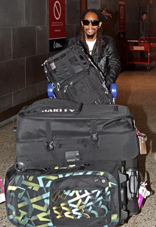 Whaaaat?! - Lil Jon arriving at Melbourne International Airport with more bags than Prince Akeem. The rapper/Celebrity Apprentice was in town for the MTV Snow Jam 2011.&nbsp; (Photo by Scott Barbour/Getty Images)