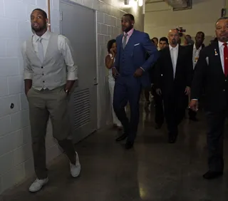 The Long Walk\r - Miami Heat's Dwyane Wade and LeBron James walk down the hall after game 6 to a press conference.\r(Photo: AP Photo/Lynne Sladky)