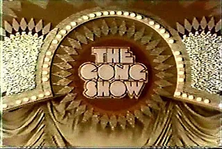 The Gong Show - The Gong Show took a unique approach to talent competition by incorporating humor through a panel of rotating celebrity judges and recurring segments. The show had such a cult following that a movie was released in 1980 titled The Gong Show Movie about host Chuck Barris. &nbsp;(Photo: www.skooldays.com)