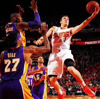 Special Delivery - Four Los Angeles Lakers helplessly&nbsp;watch as Phoenix Suns guard Goran Dragic goes up for a layup in the Suns’ 119-99 win. Got Kobe Bryant in the shot. Not bad.(Photo: Phoenix Suns via Instagram)