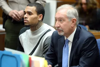 Chris Brown - Breezy's legal burdens got a lot lighter this year for the bargain price of $100,000. In October the singer settled two lawsuits, one with the man he allegedly sucker punched outside of a Washington, D.C., hotel and the other with Frank Ocean's cousin Chris for their altercation over a parking spot. (Photo: Robyn Beck/Pool/Getty Images)