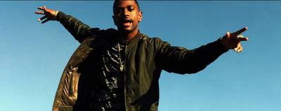 Calvin Harris Teams Up With Big Sean for New Song - DJ Calvin Harris&nbsp;has dropped the visuals for his new single, ?Open Wide,? featuring Big Sean. The beat, which was originally lifted from an older track by Harris, has been rejuvenated with an energy that only Big Sean can bring. The video offers a interesting treatment to the song, putting Big Sean in the middle of the desert with what looks like a really bad drug war. You?ll just have to see for yourself.&nbsp;(Photo: Sony Music Entertainment UK Limited)