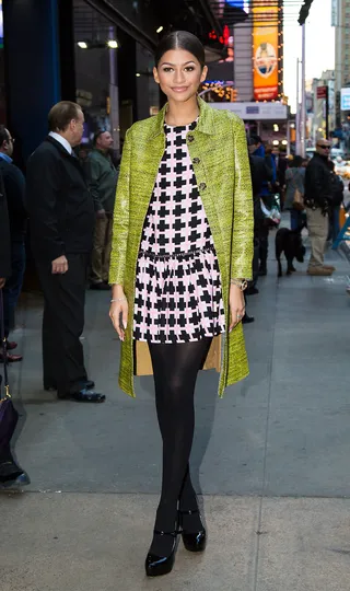 Trending - Zendaya poses for a pic before heading into&nbsp;Good Morning America&nbsp;wearing the perfect fall ensemble in NYC.(Photo: Allan Bregg / Splash News)
