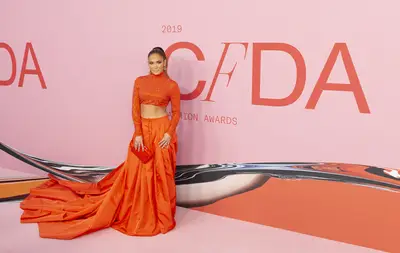 A Fashion Icon - J. Lo&nbsp;was the recipient of the Fashion Icon award at the 2019 CFDA Awards. She graced their pink and red carpet in a two-piece, vibrant, red, custom by&nbsp;Ralph Lauren.&nbsp;&nbsp;(Photo: Lev Radin/Pacific Press/LightRocket via Getty Images)