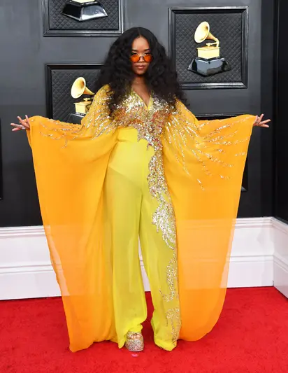 Styled by Christina Joy - Image 1 from GRAMMYS 2022: See All The  Jaw-Dropping Gowns And Trendy Suits Spotted On The Red Carpet!