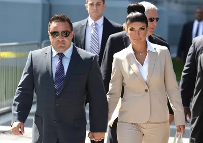 Teresa and Joe Giudice - Taking the heat off of the Atlanta cast, Teresa and Joe Giudice of the Real Housewives of New Jersey have been sentenced to prison for fraud. Joe received 41 months in the slammer while his wife, New Jersey housewife Teresa, will serve 15. The couple is also reportedly in negotiations to document their last days with their family on camera. Their sentences will begin at the top of 2015.(Photo: Mike Coppola/Getty Images)