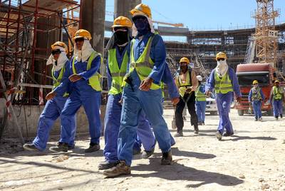 Death in Qatar Sparks Concerns for Migrant Workers - The Arab state of Qatar, which is due to host the 2022 World Cup, came into sharp focus this week for all the wrong reasons. Following the death of a 29-year-old construction worker who suffered a heart attack, reports surfaced detailing the “inhumane” work conditions and practices of many of the country’s migrant workers, according to Amnesty International.&nbsp;(Photo: EPA/STR /LANDOV)