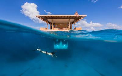 Africa Gets First Underwater Hotel - Accommodation for tourists in Africa has taken a new twist; Tanzania has become the first country in the region to boast of an underwater hotel room. The three-story Manta Resort on Pemba Island was built by Swedish developers Genberg Underwater Hotels and is situated on a floating island.&nbsp; Guests are treated to views of the amazing marine life in the Indian Ocean.&nbsp; &nbsp;(Photo: Ben Hider/Getty Images via NYSE Euronext)