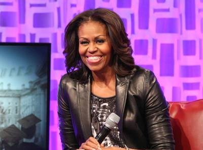 Full Court Press - First Lady Michelle Obama&nbsp;participated in interviews on three African-American radio stations to promote the health care law after meeting with a group of mothers to discuss accessing affordable health care for their families. The president also promoted the law in an interview with talk-show host Steve Harvey set to air Dec. 20.(Photo: Bennett Raglin/BET/Getty Images for BET)