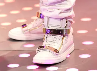 Electric Sneaks - A shot of Yo Gotti's white and gold sneaks on 106. (Photo: Bennett Raglin/BET/Getty Images for BET)