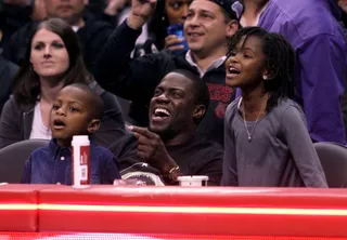 Game Time With Daddy - Kevin Hart enjoys watching the LA Clippers take on the Brooklyn Nets at the Staples Center with his son and daughter in Los Angeles.&nbsp;(Photo: WENN.com)