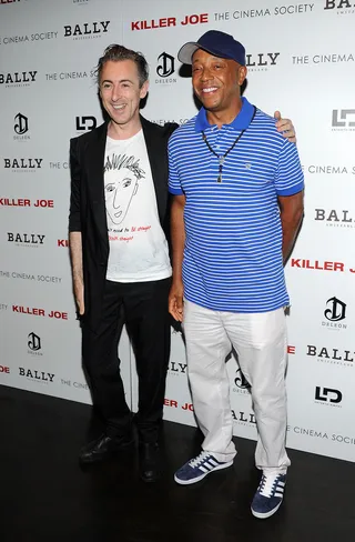 The In-Crowd - Actor Alan Cumming poses with Russell Simmons at the Cinema Society with Bally &amp; DeLeon screening of LD Entertainment's Killer Joe at the Tribeca Grand Hotel Screening Room in New York City. (Photo: Larry Busacca/Getty Images)