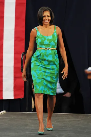 Michelle Obama - Show up to your park-side nuptials blooming in a flashy floral number. You can belt it like the FLOTUS did this Chris Benz sheath or jazz it up with peep-toe pumps and cat-eye frames.&nbsp;  (Photo: Larry Marano/WireImage)